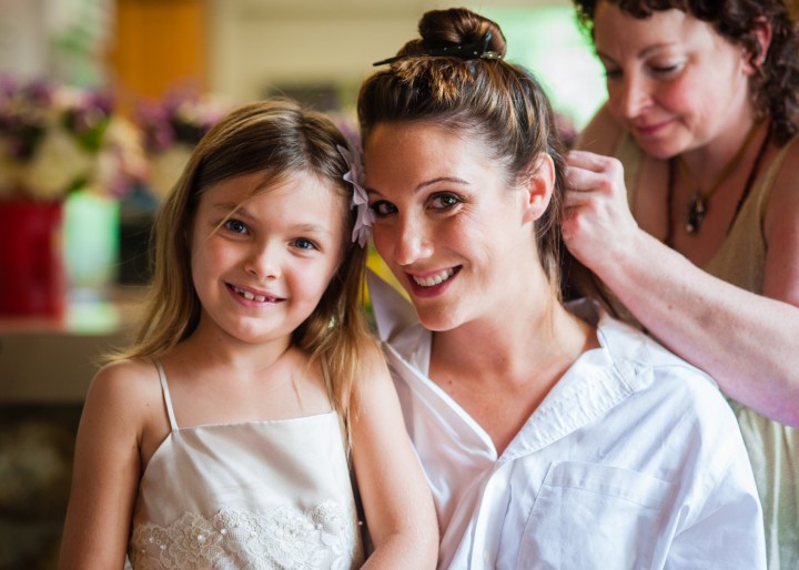 Bride and Flower Girl Posing for a Quick pictures during getting ready