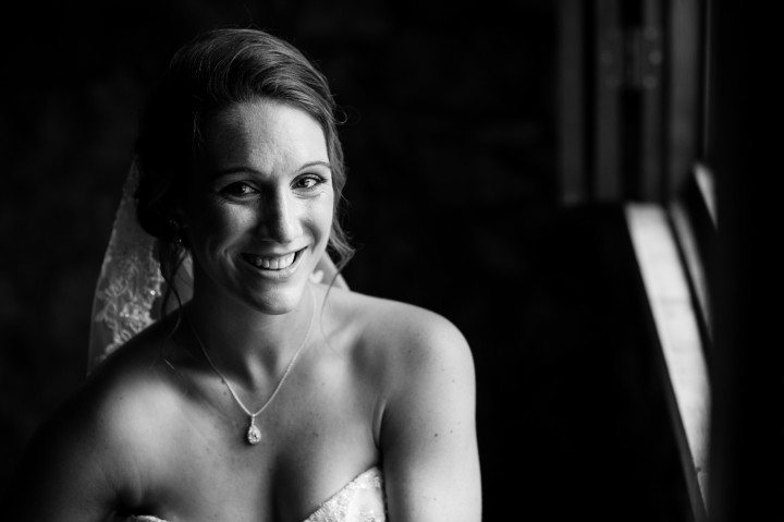 Bride poses for a moment before her ceremony at Gaither Chapel