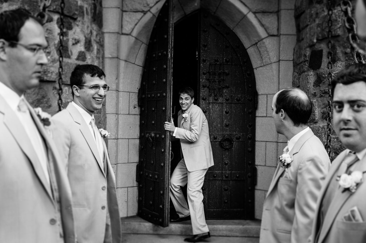 Handsome groom and his groomsmen get goofy for a picture