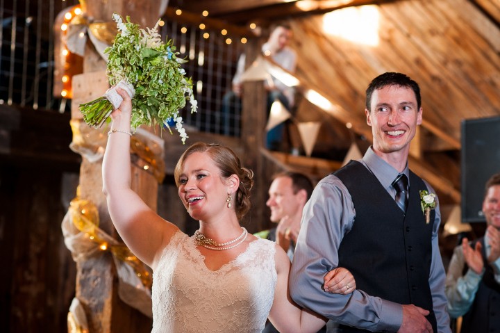 Jess and Paul happily enter the reception for their first dance 