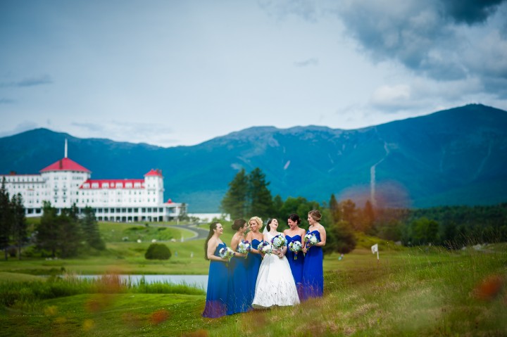 the gorgeous bride and her beautiful bridesmaids giggle during bridal party portraits