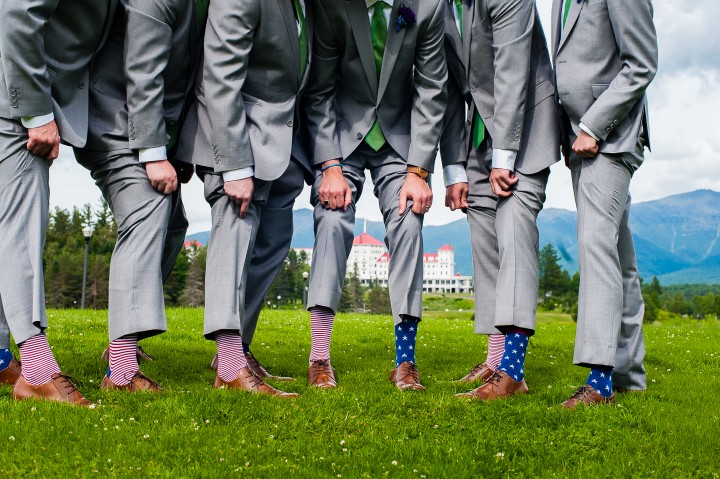 the groom and his gentlemen show off their red white and blue patriotic wedding socks