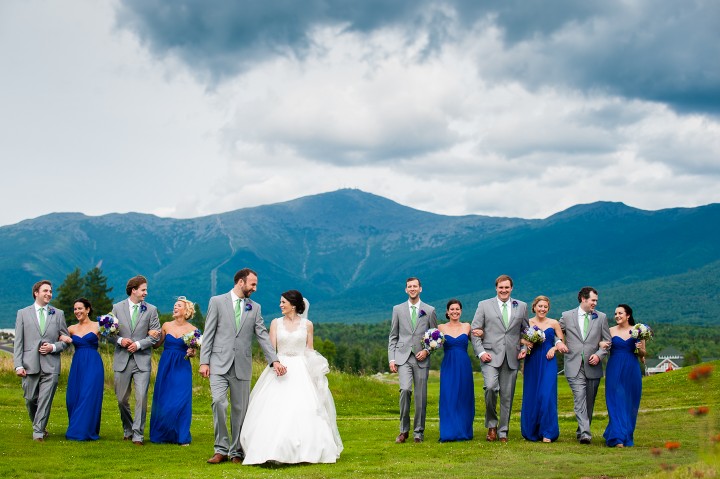 the wedding party walking across mount washington hotels stunning golf course