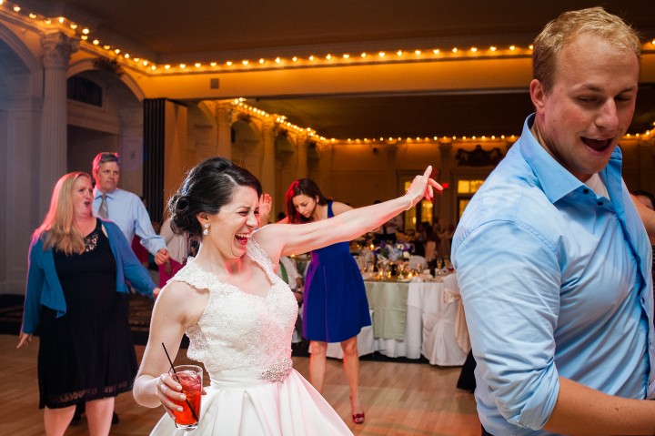 the beautiful bride dances during her fun wedding reception 