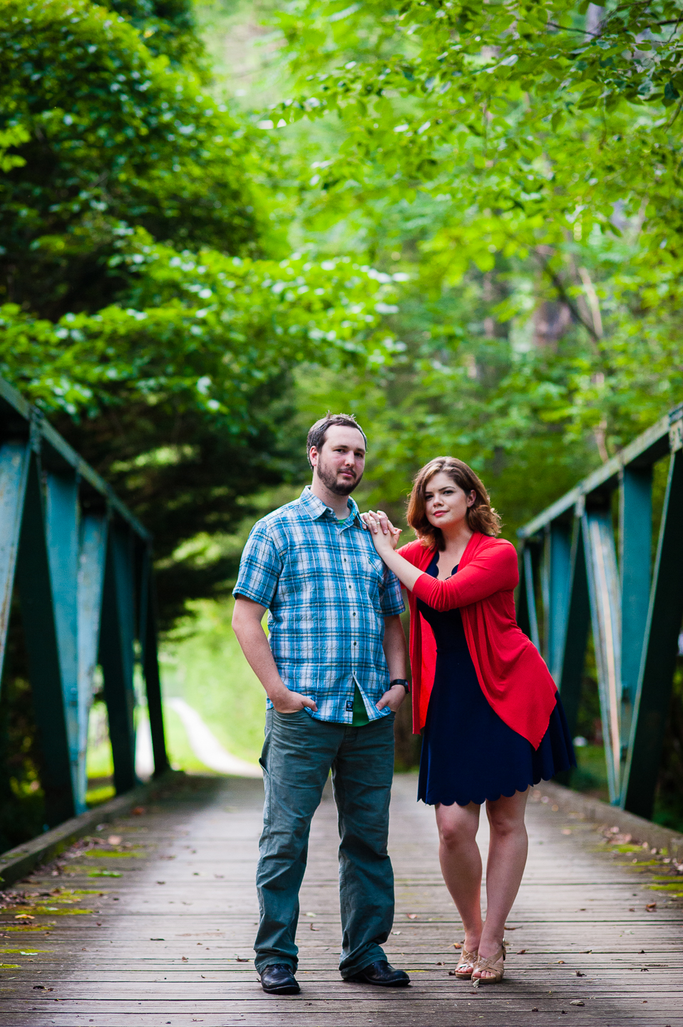 bride and groom looking at the camera for this wedding day couples portrait 