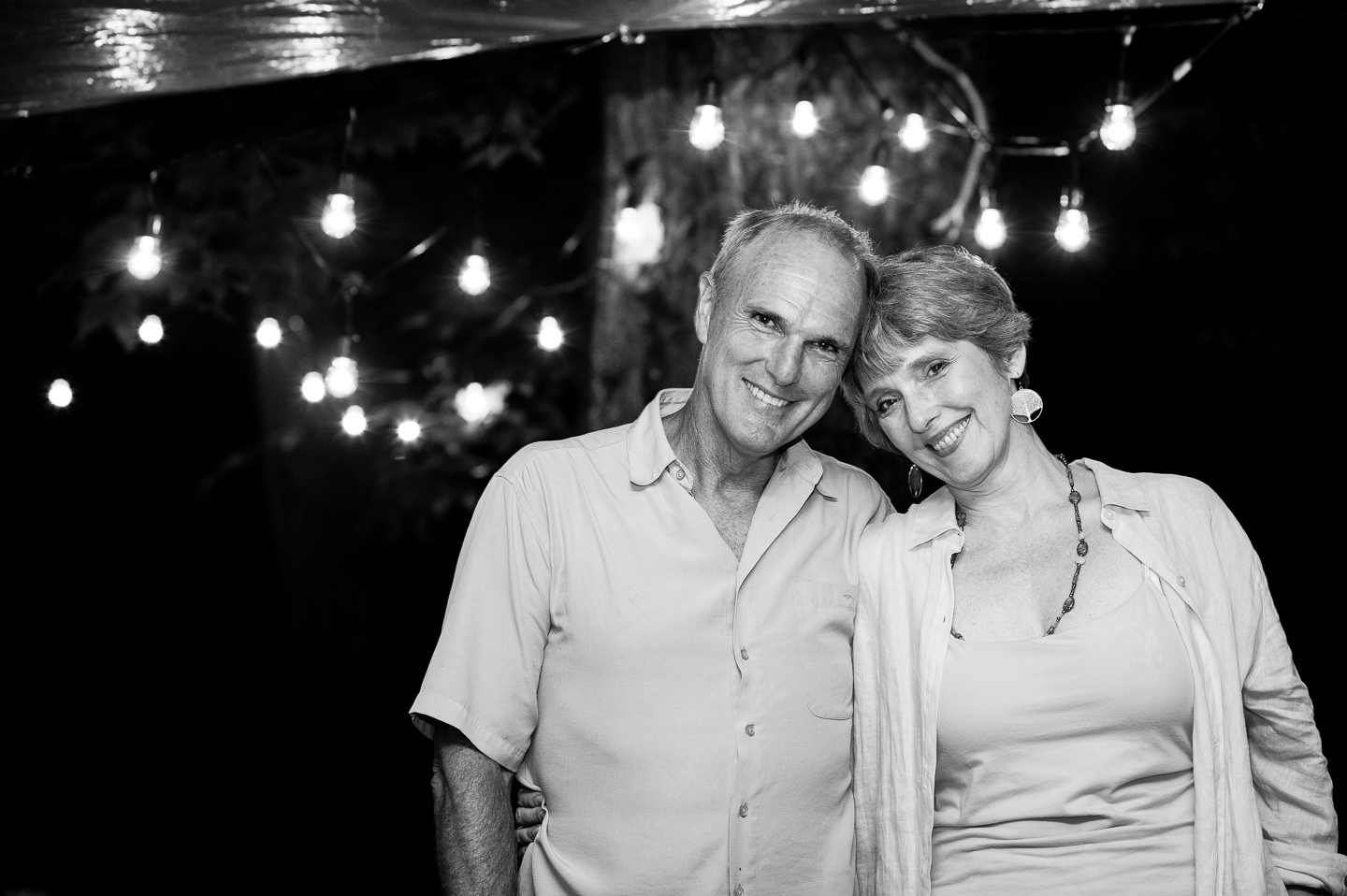 wedding guests smile at camera for a quick portrait 