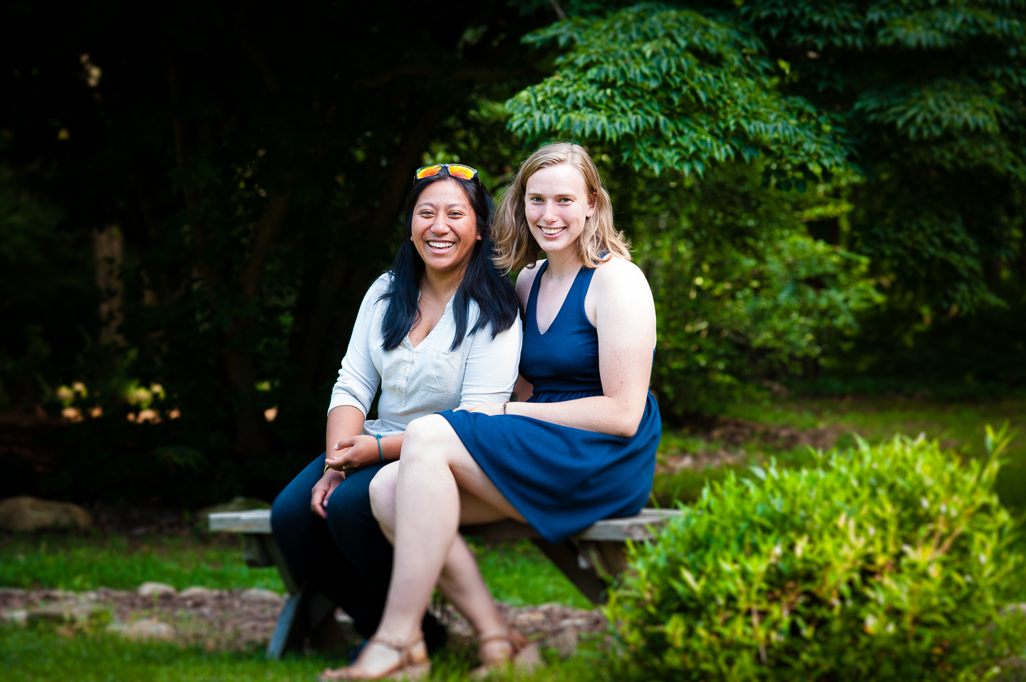 recently engaged couple smiles at the camera for quick photo