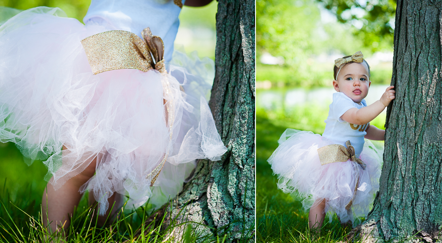 little girl dressed in a cute frilly tutu for her outdoor first year portraits 