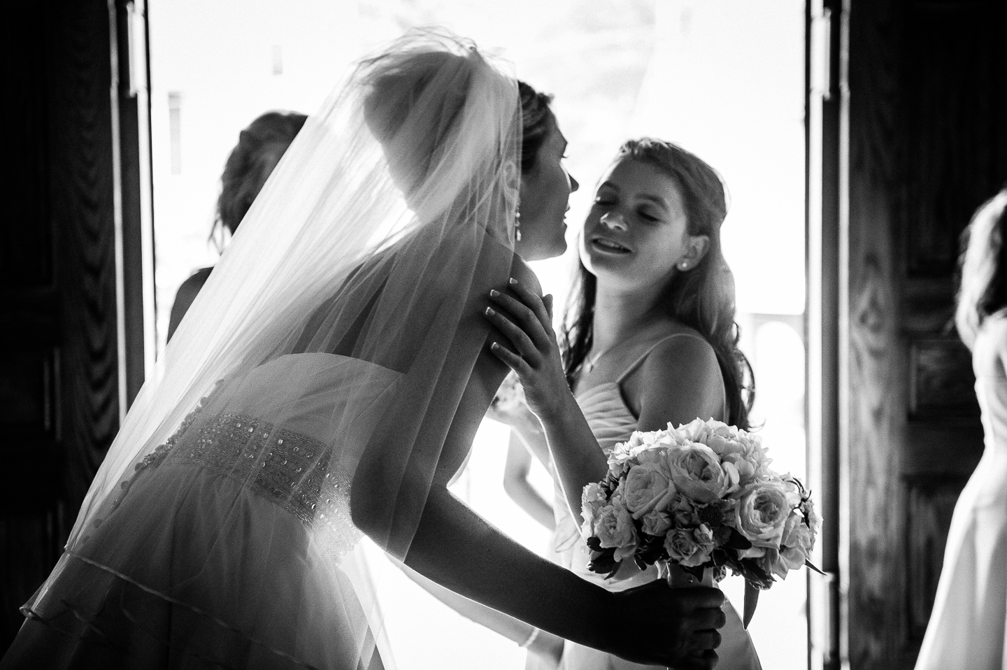 last kisses to her adorable jr bridesmaid before the bride walks down the aisle