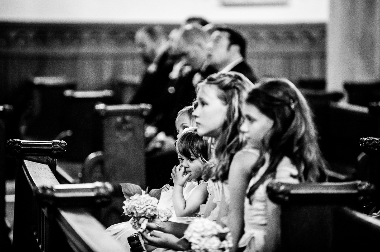 adorable flower girl is caught picking her nose during a long church wedding ceremony  