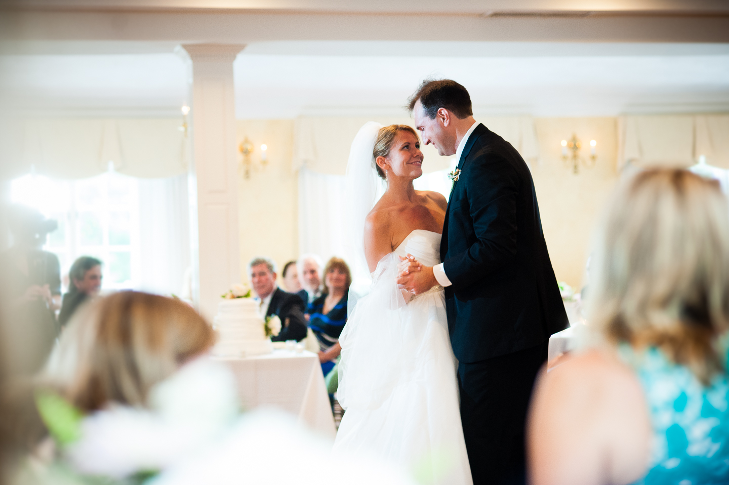 a very sweet moment between the bride and groom during their first dance as husband and wife 