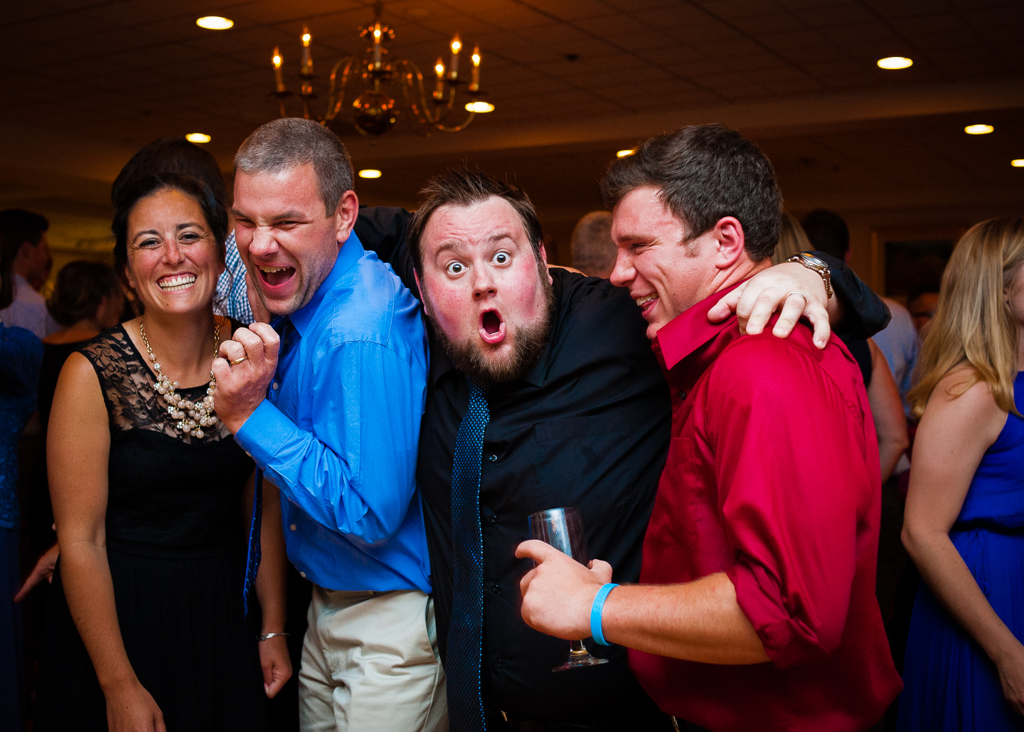 wedding guests goofing off on the dance floor 