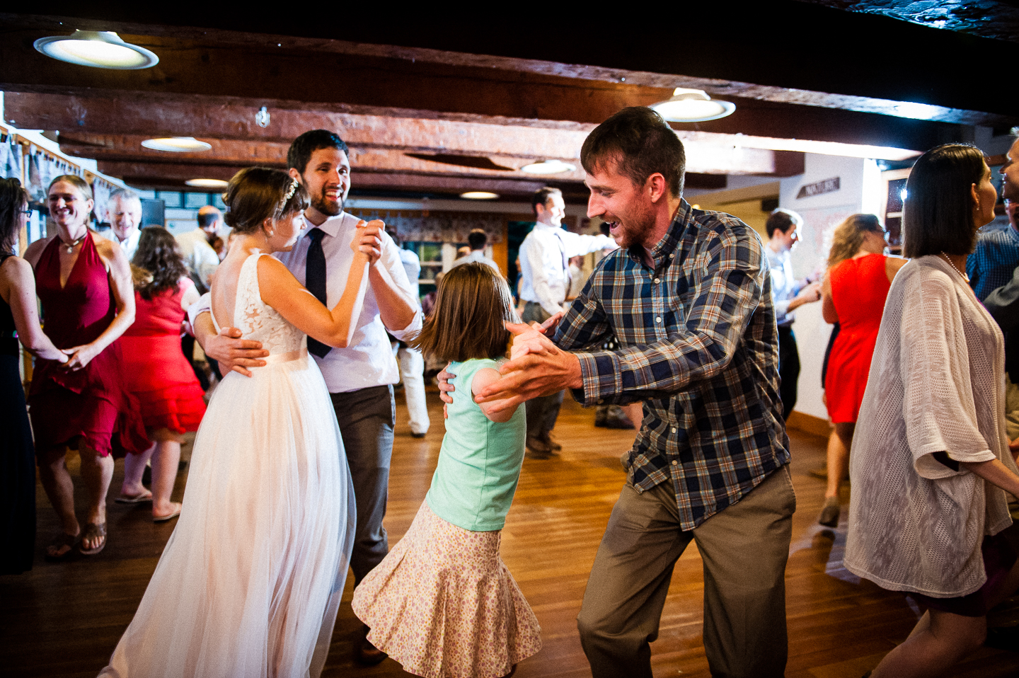 bride and groom with their guests did some awesome contract dancing