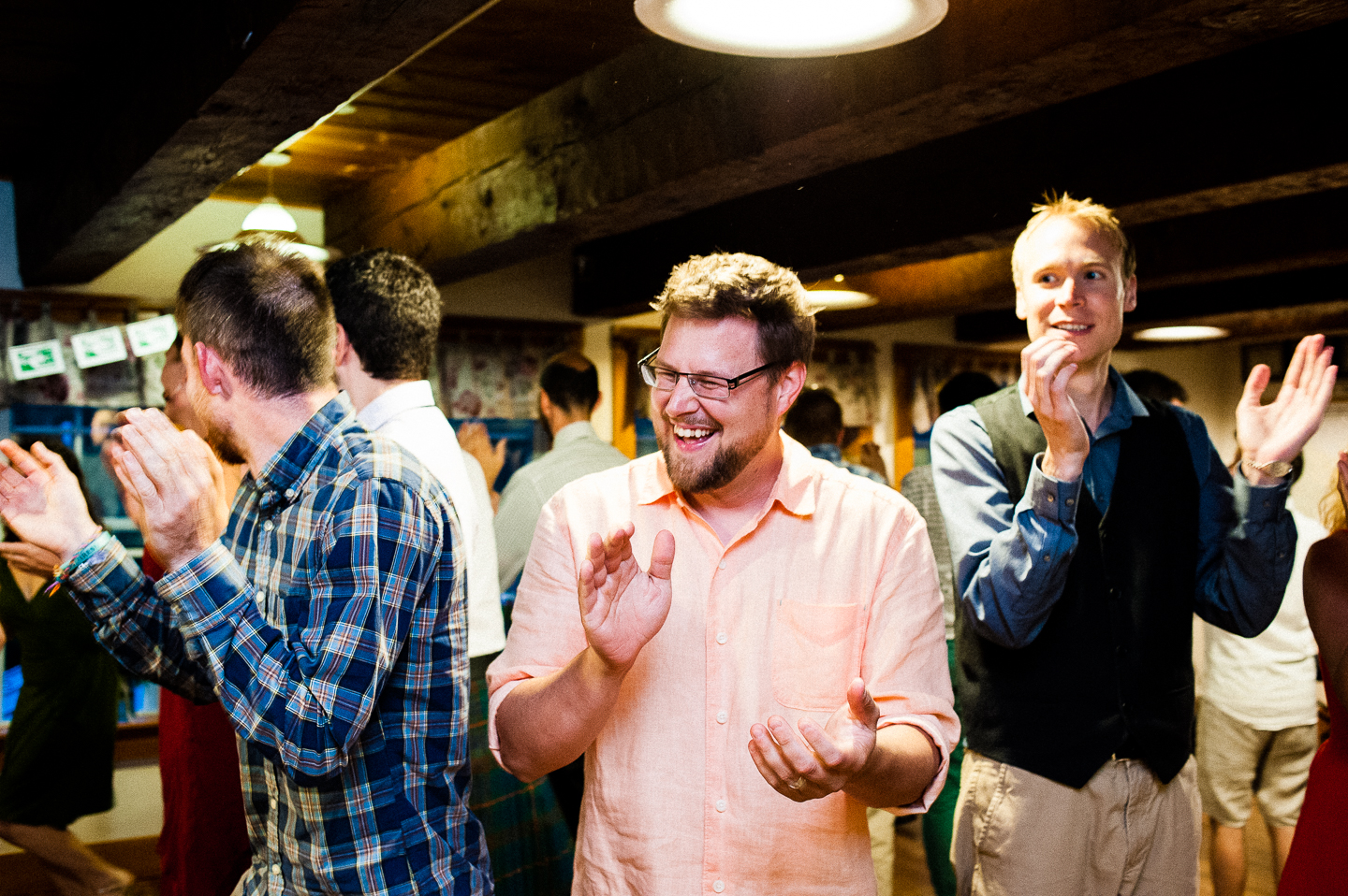 a wedding guest has fun on the dance floor