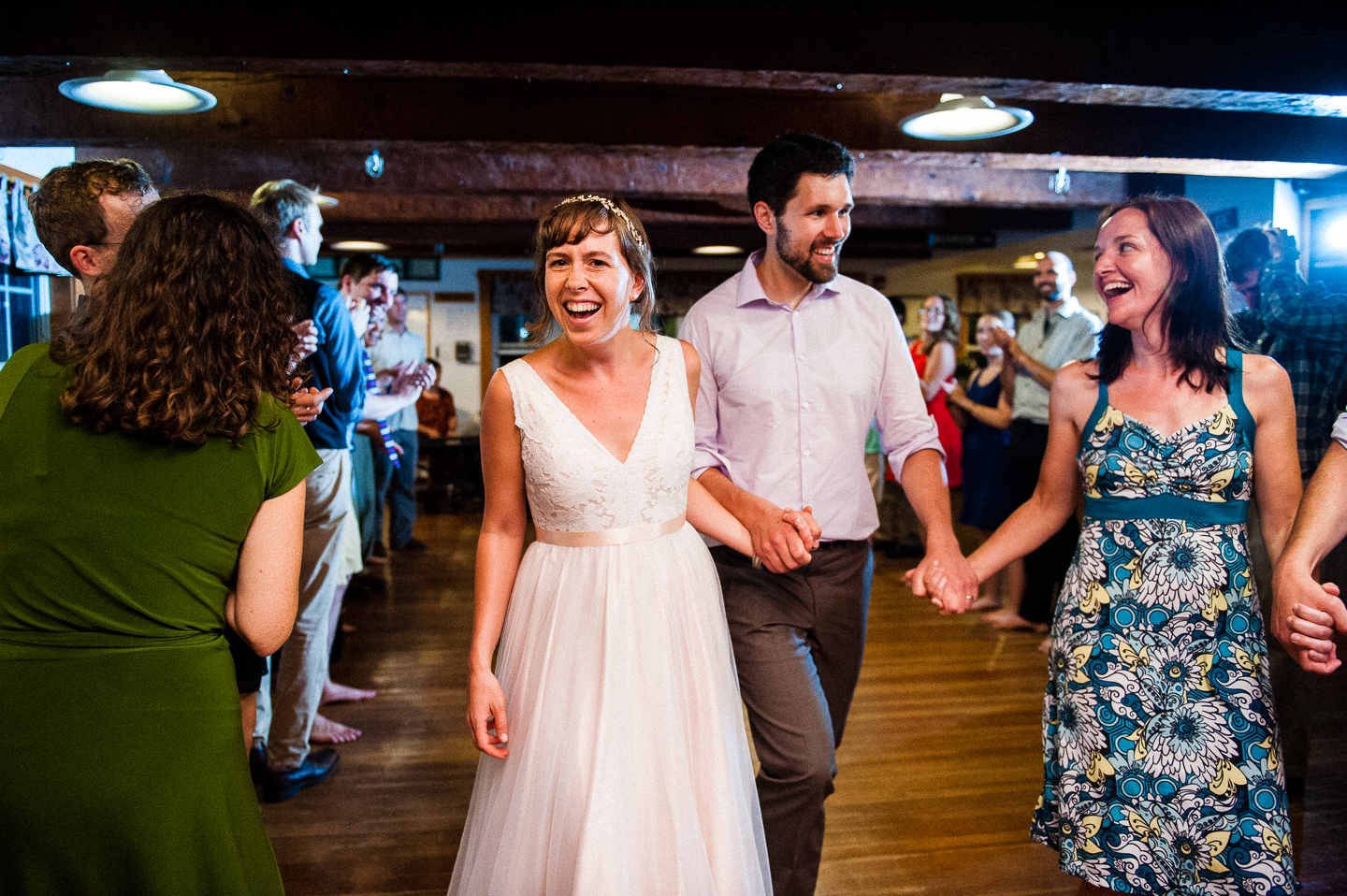 bride and groom were all smiles during their wedding reception 