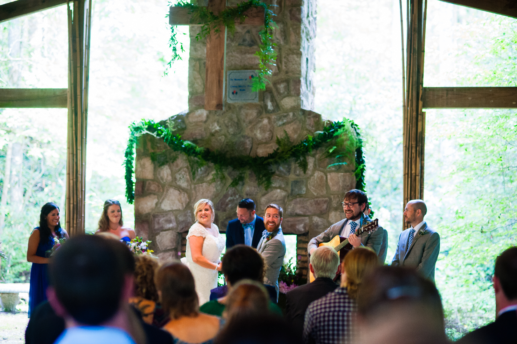 beautiful open air chapel in the woods housed this summer wedding ceremony 