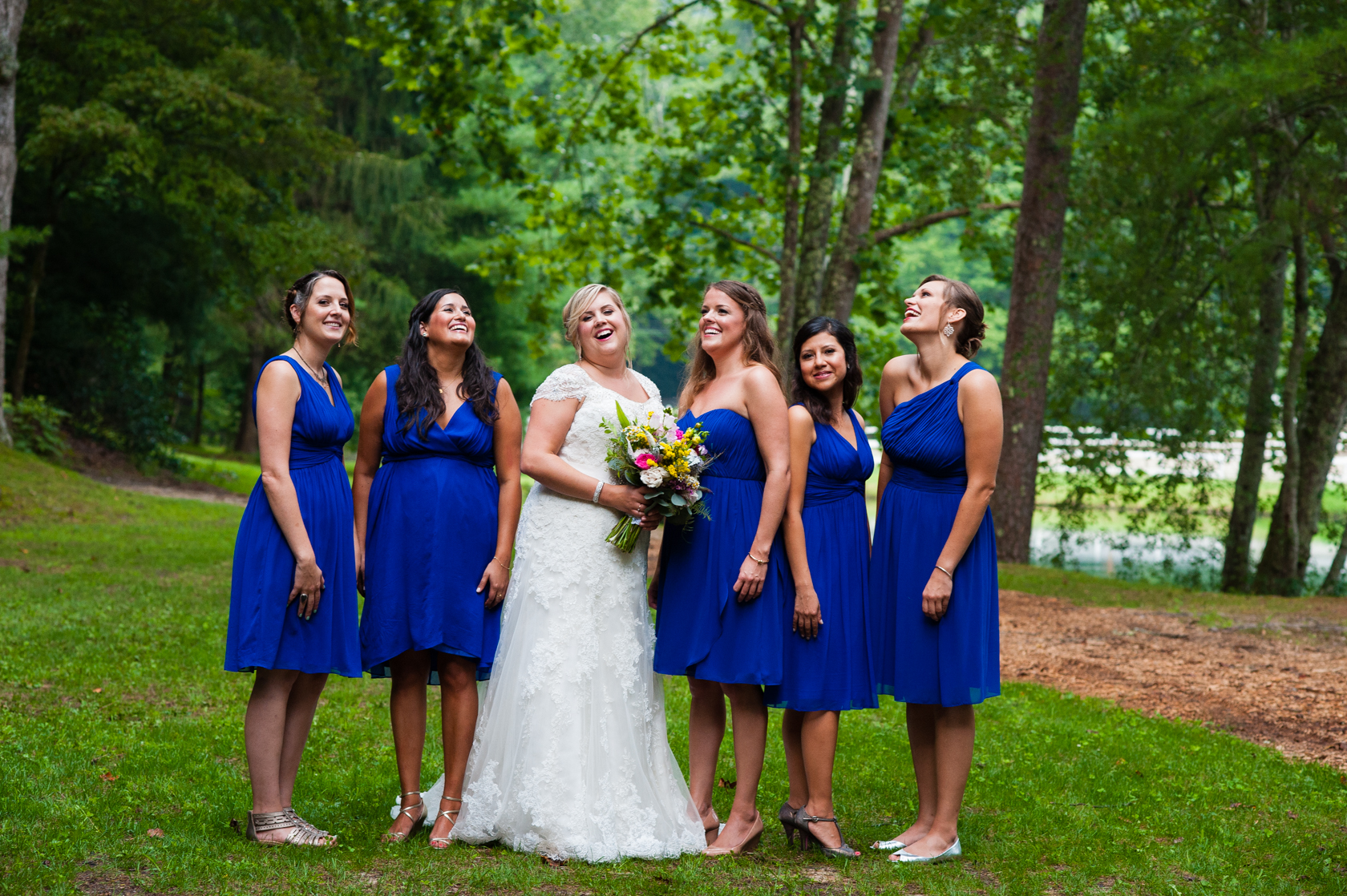 the bride and her beautiful ladies giggling together 