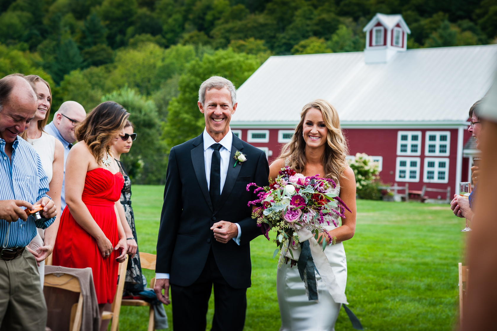 beaming dad walks his beautiful daughter down the aisle to get married 