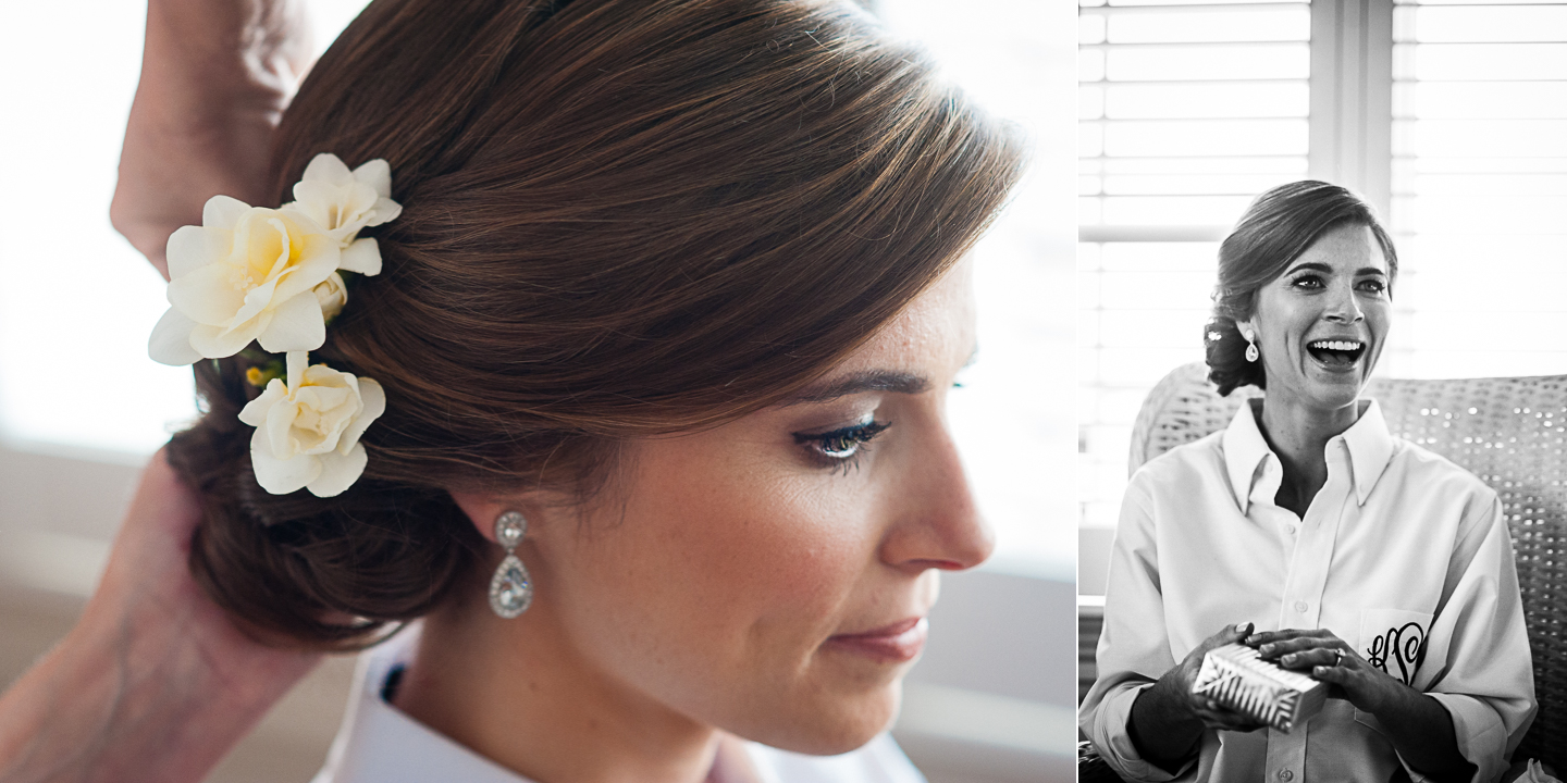 bride shows off the simple white flower in her hair 