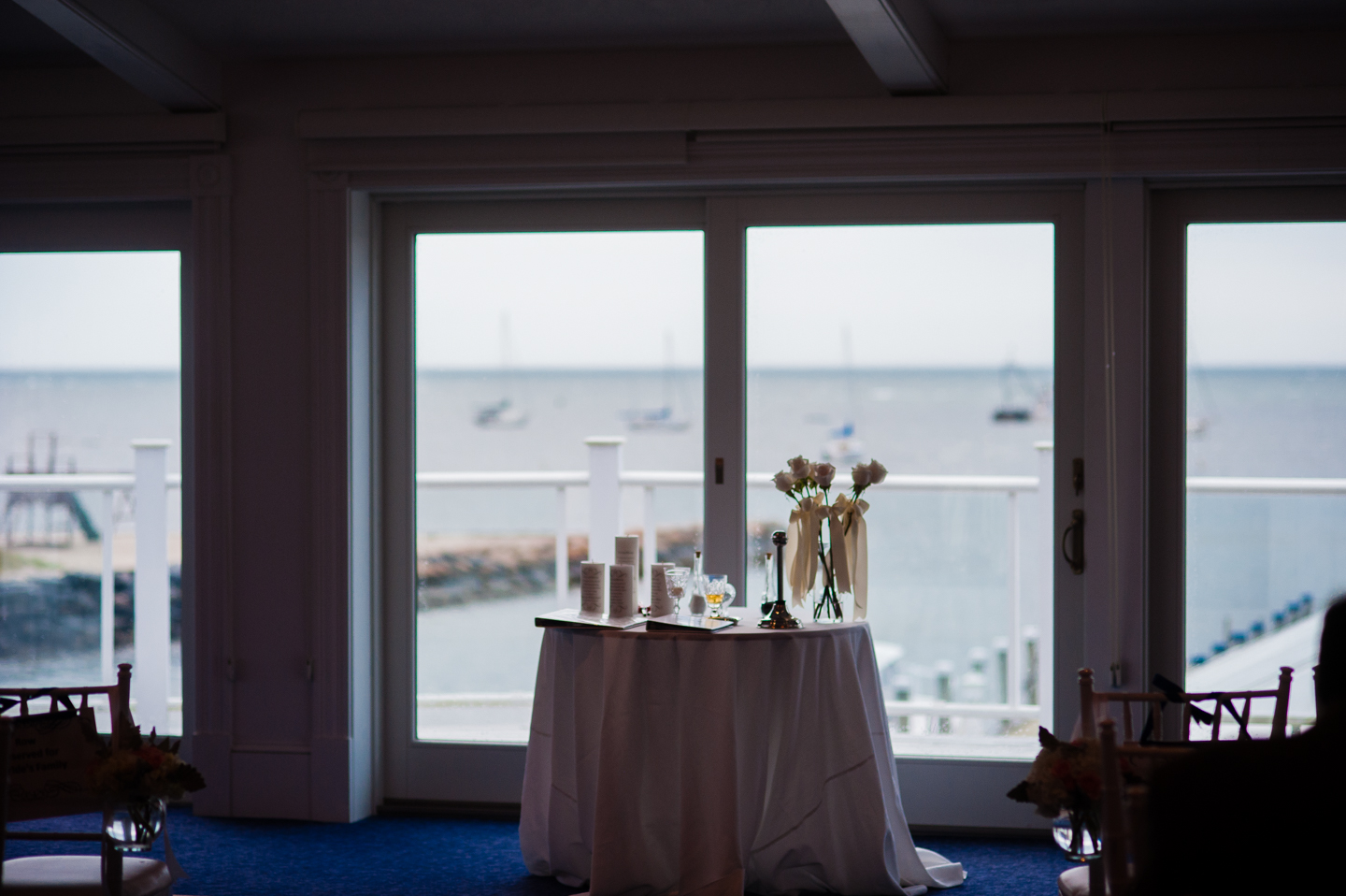 the ceremony took place in a ballroom overlooking the wychmere harbor