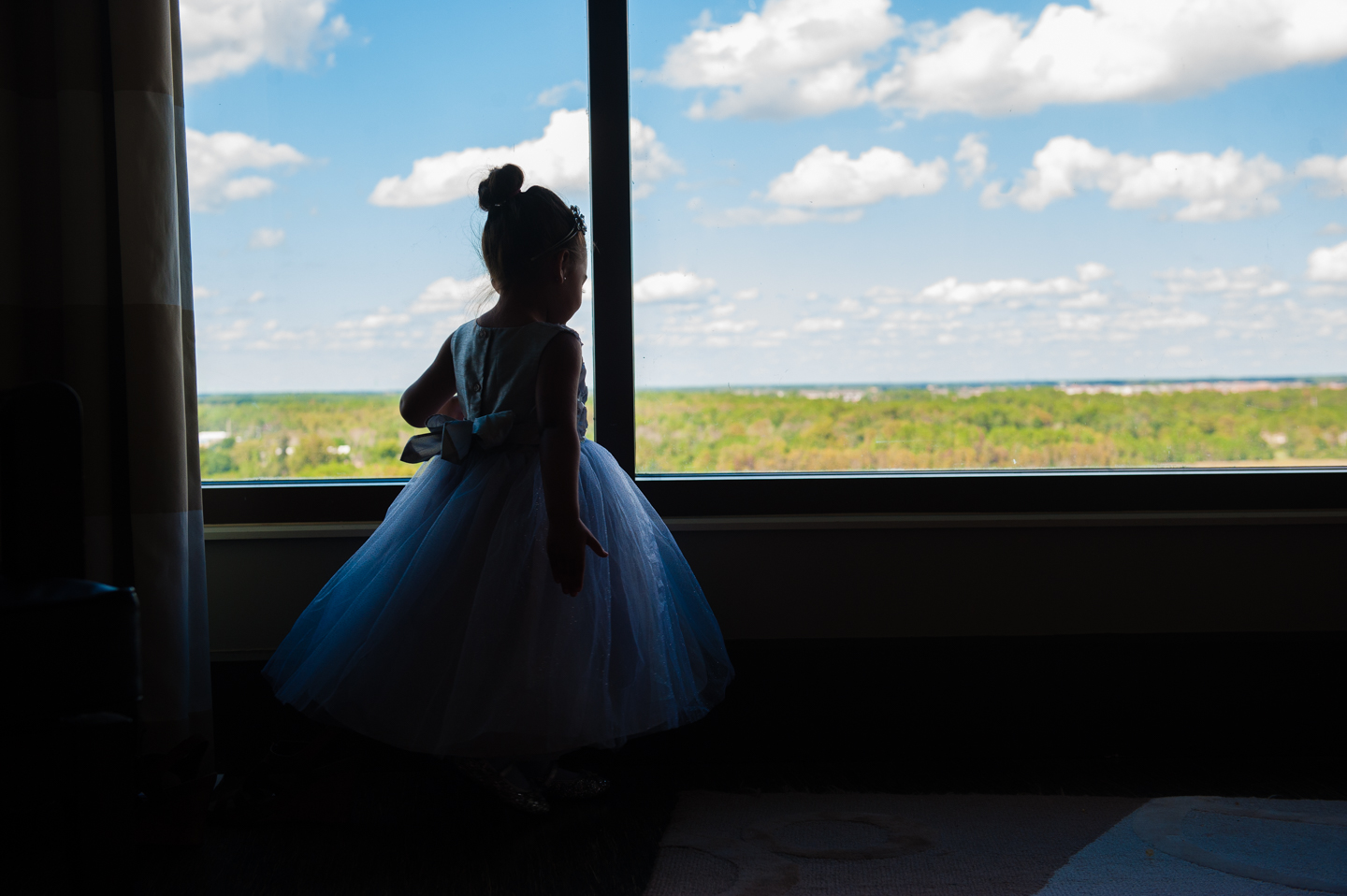 silhouette of flower girl in disney contemporary resort  