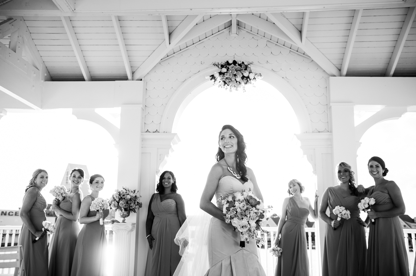 bride and gorgeous ladies pose at seabreeze point 