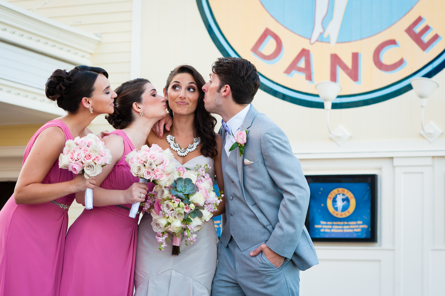 bride and siblings in front of atlantic dance hall 