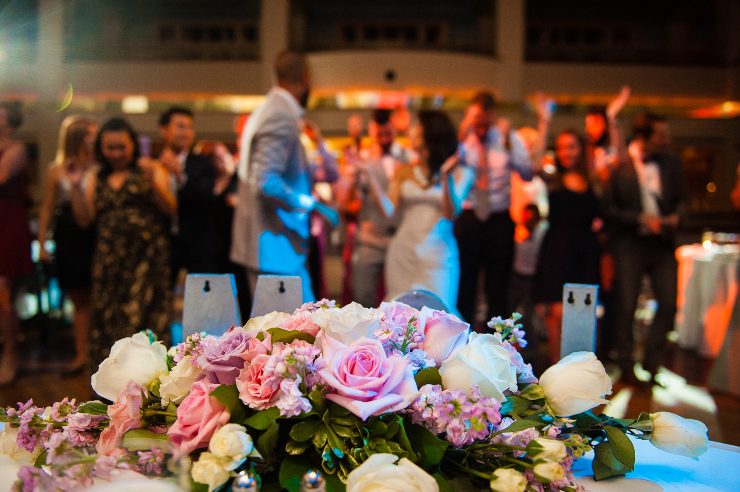 gorgeous flowers adorn atlantic city dance hall wedding reception 