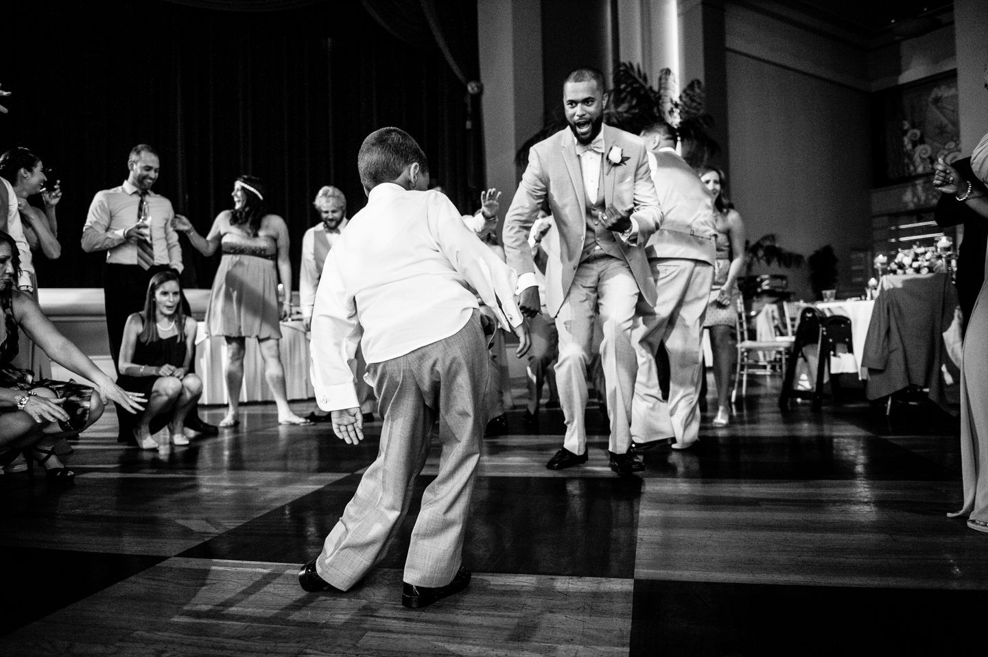 groom and ringer bearer dancing at atlantic city dance hall 