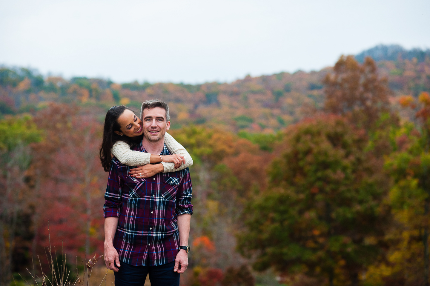 young couple fall foliage at nc arboretum 