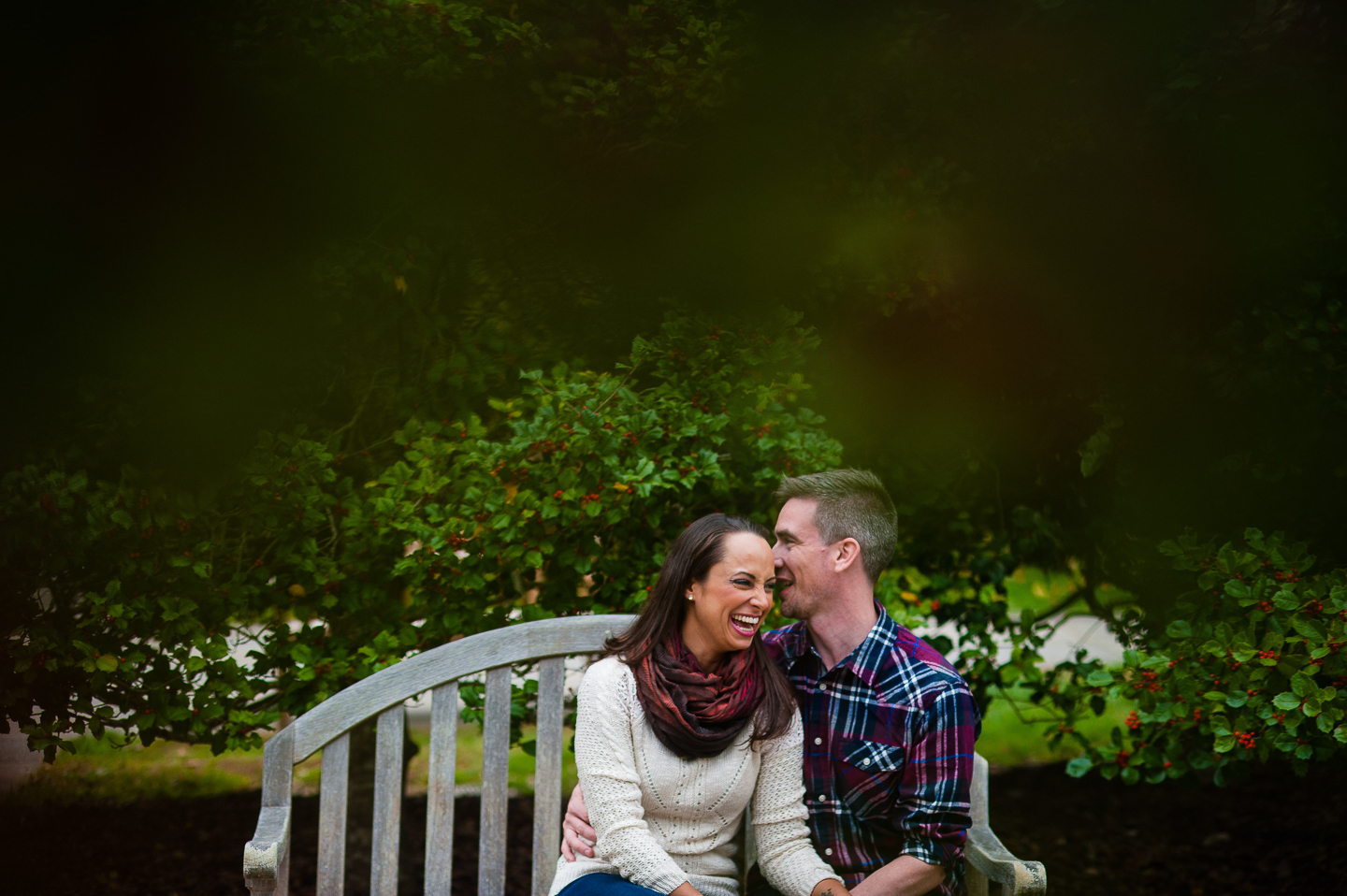 couple laughing fall engagement nc arboretum 