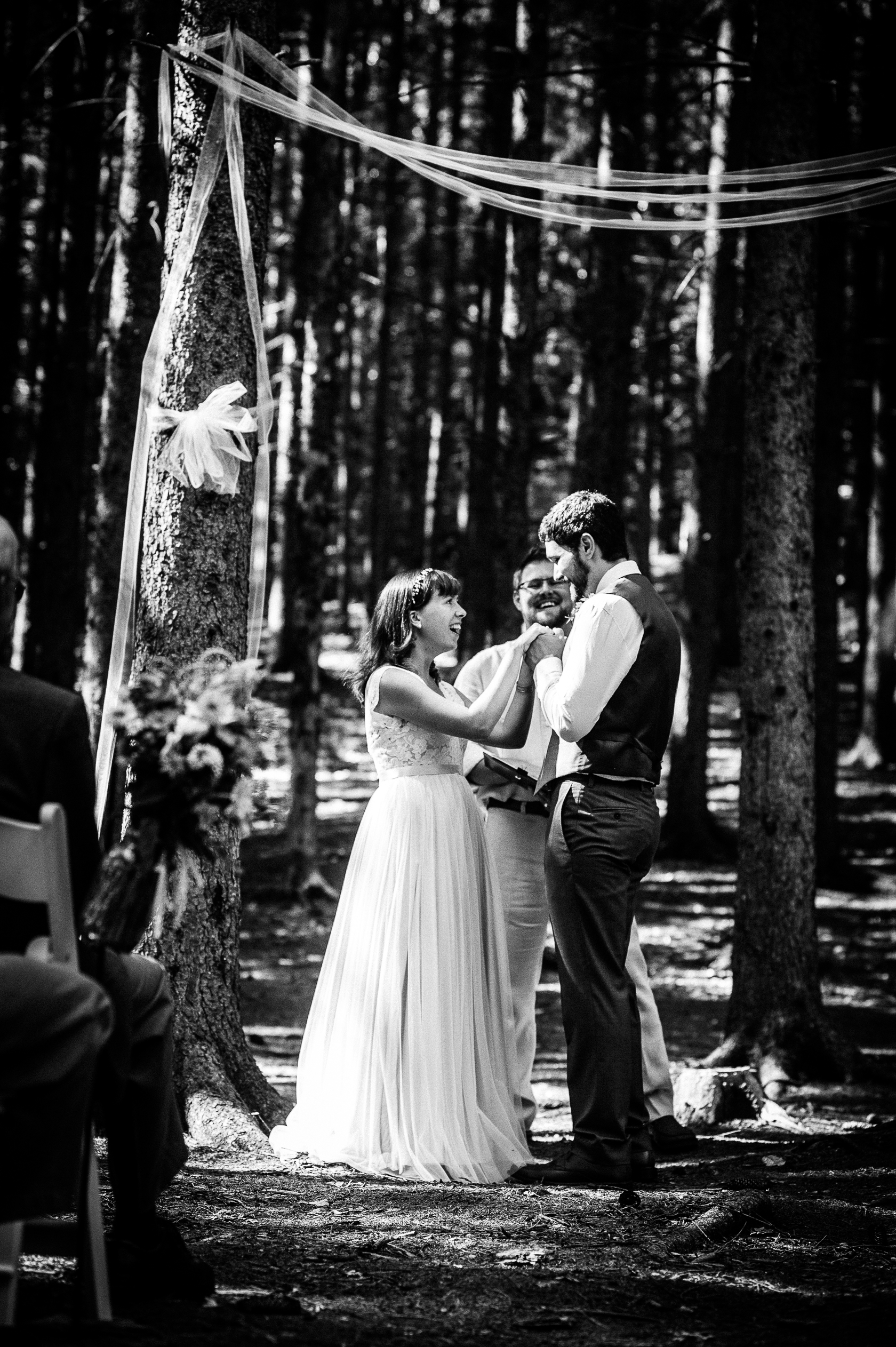 emotional photo of intimate ceremony in the woods