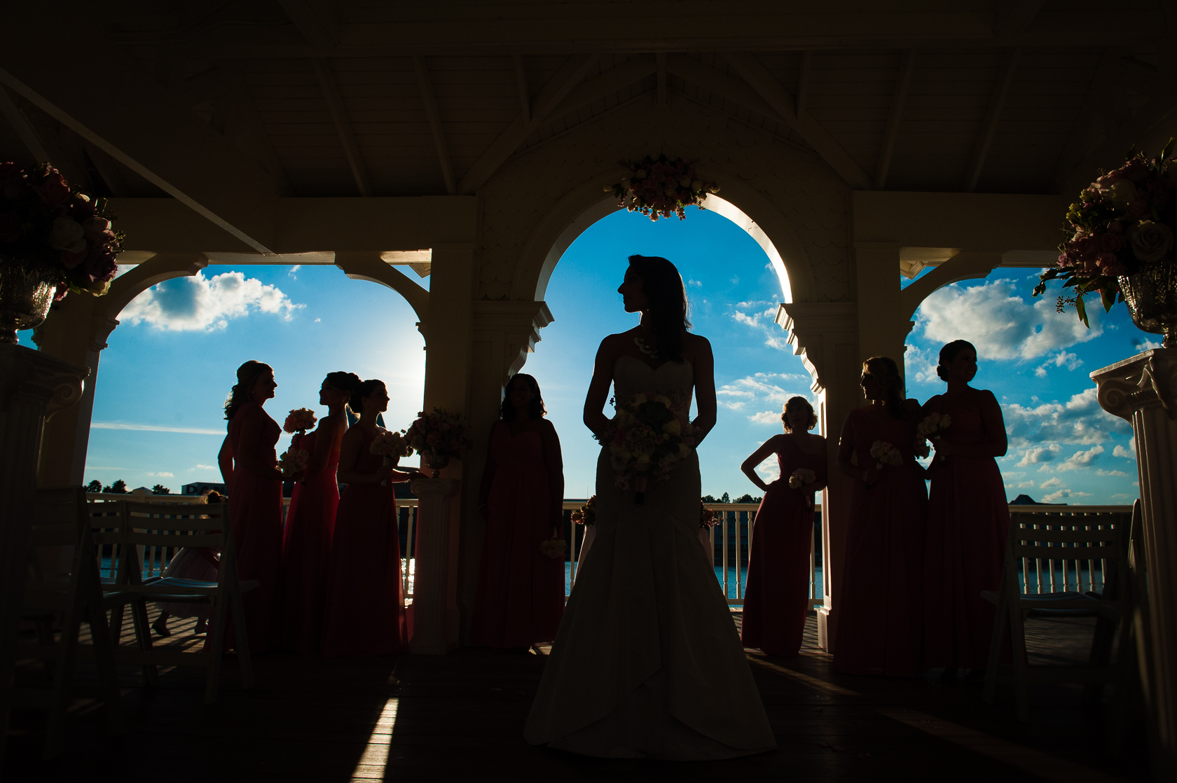 silhouette of bride and ladies Seabreeze point during disney world wedding