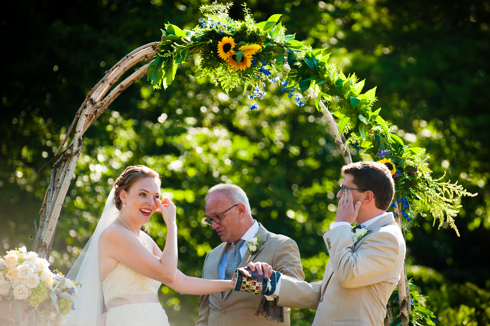 photograph of emotional moment during asheville garden wedding 