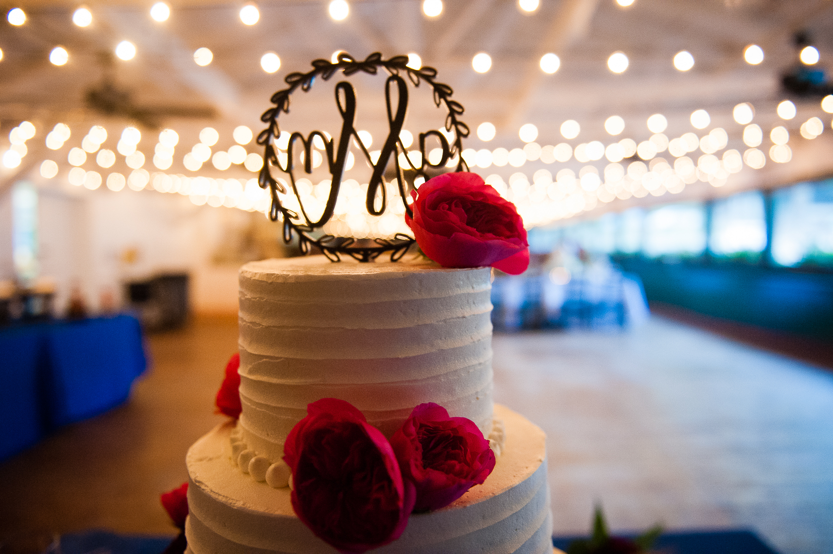 Camp Ton A Wandah elegant wedding cake in summer camp dining hall  