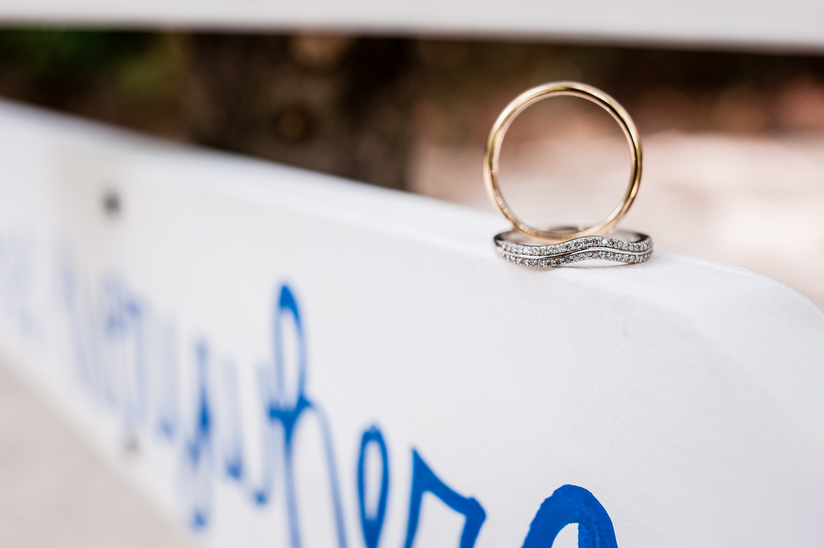 wedding rings perched on Camp Ton A Wandah Wedding Sign 