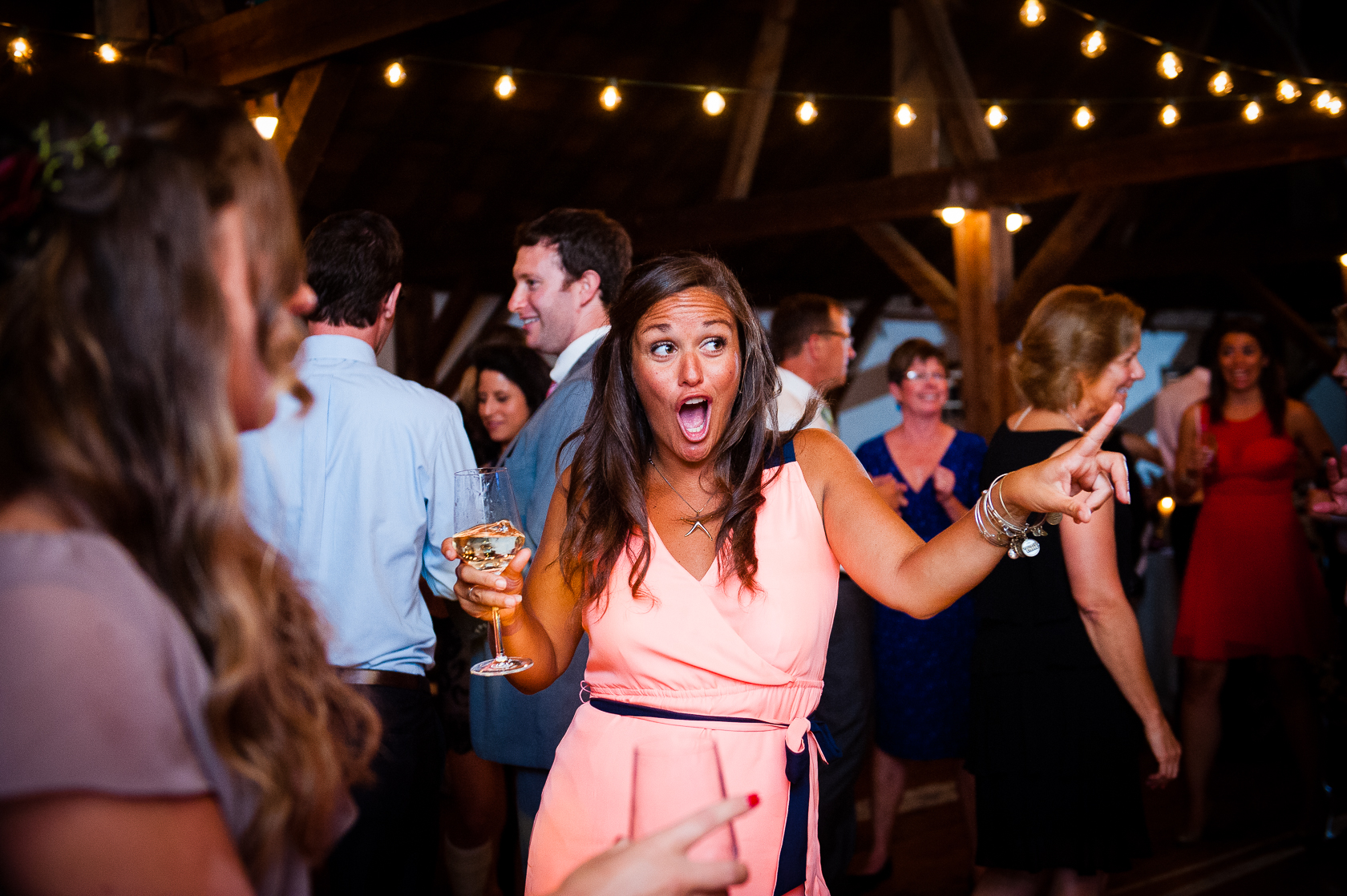 wedding guest dancing on barn wedding dance floor 