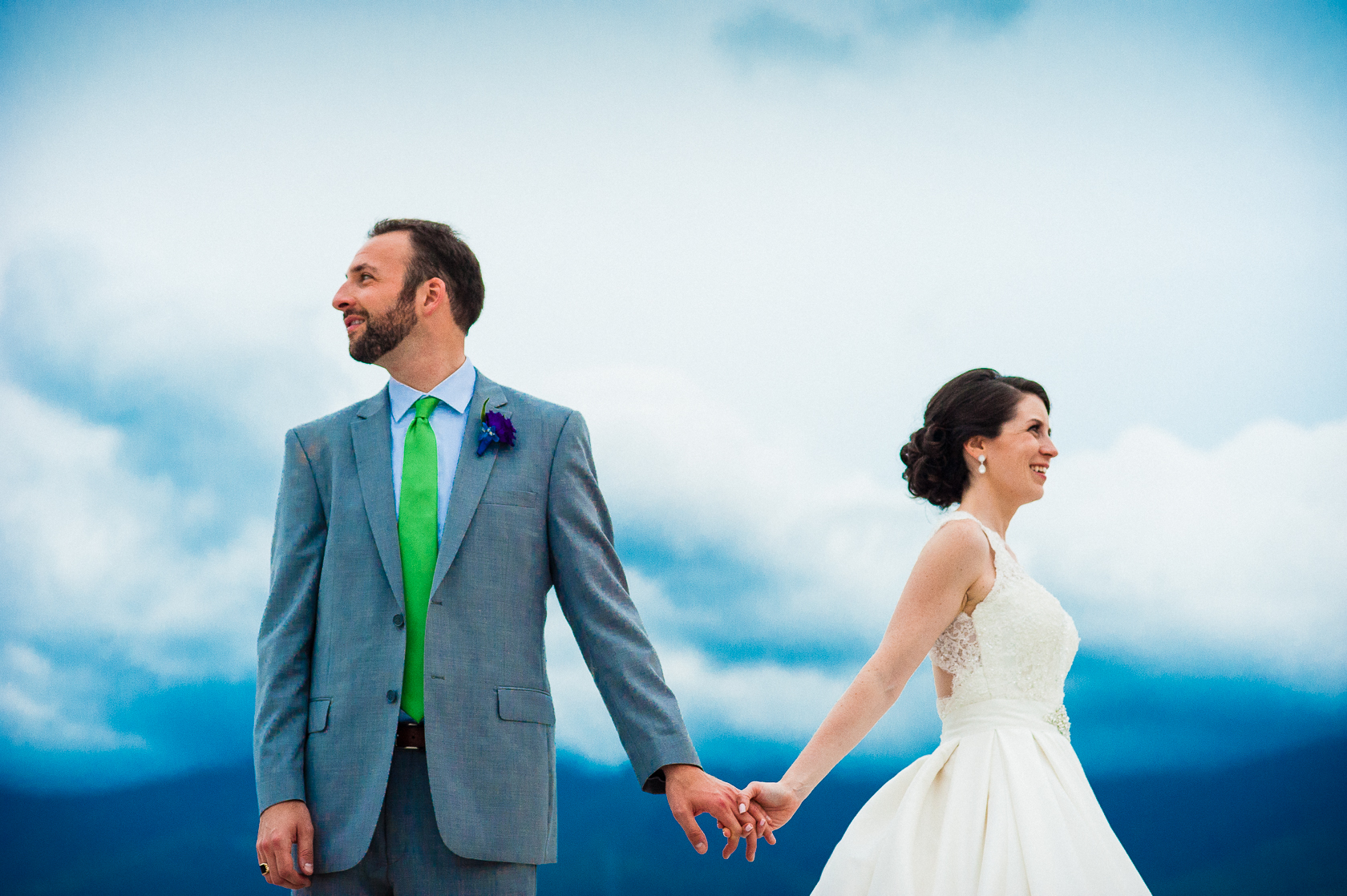 adventure mountaintop wedding portraits of bride and groom