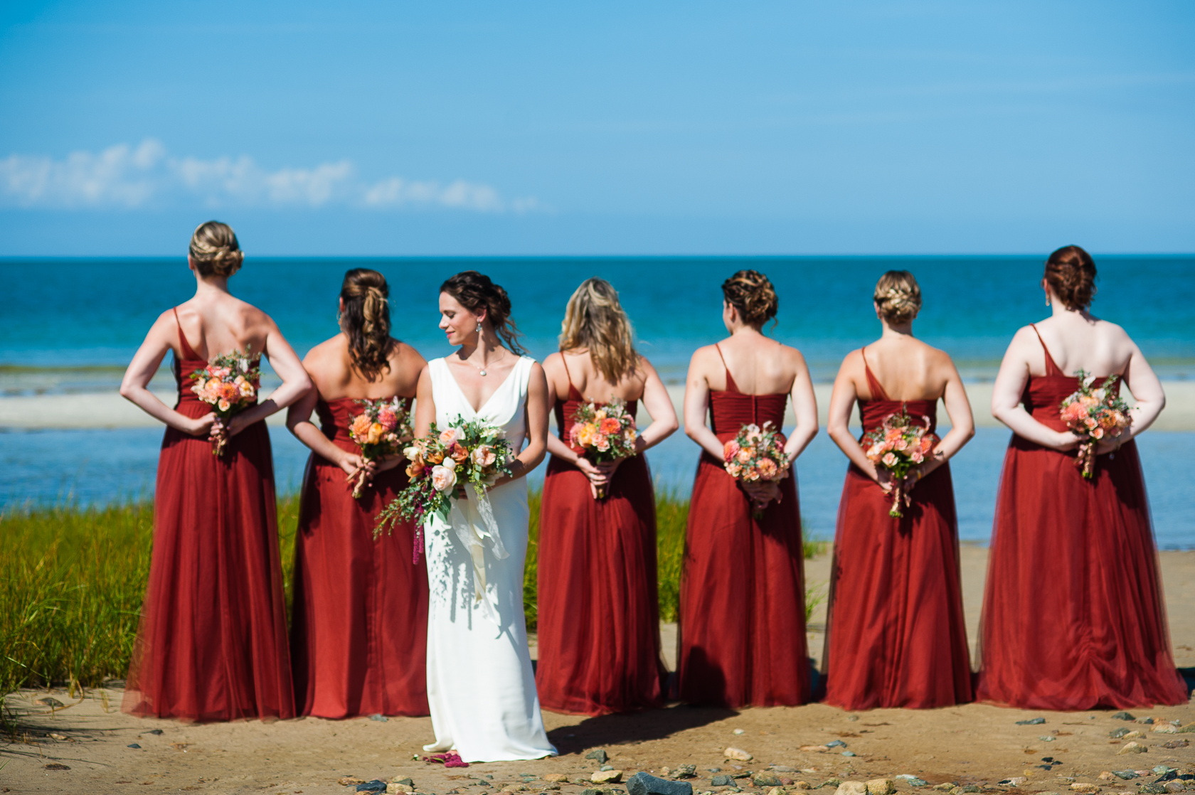 beautiful bride by ocean during seaside destination wedding 
