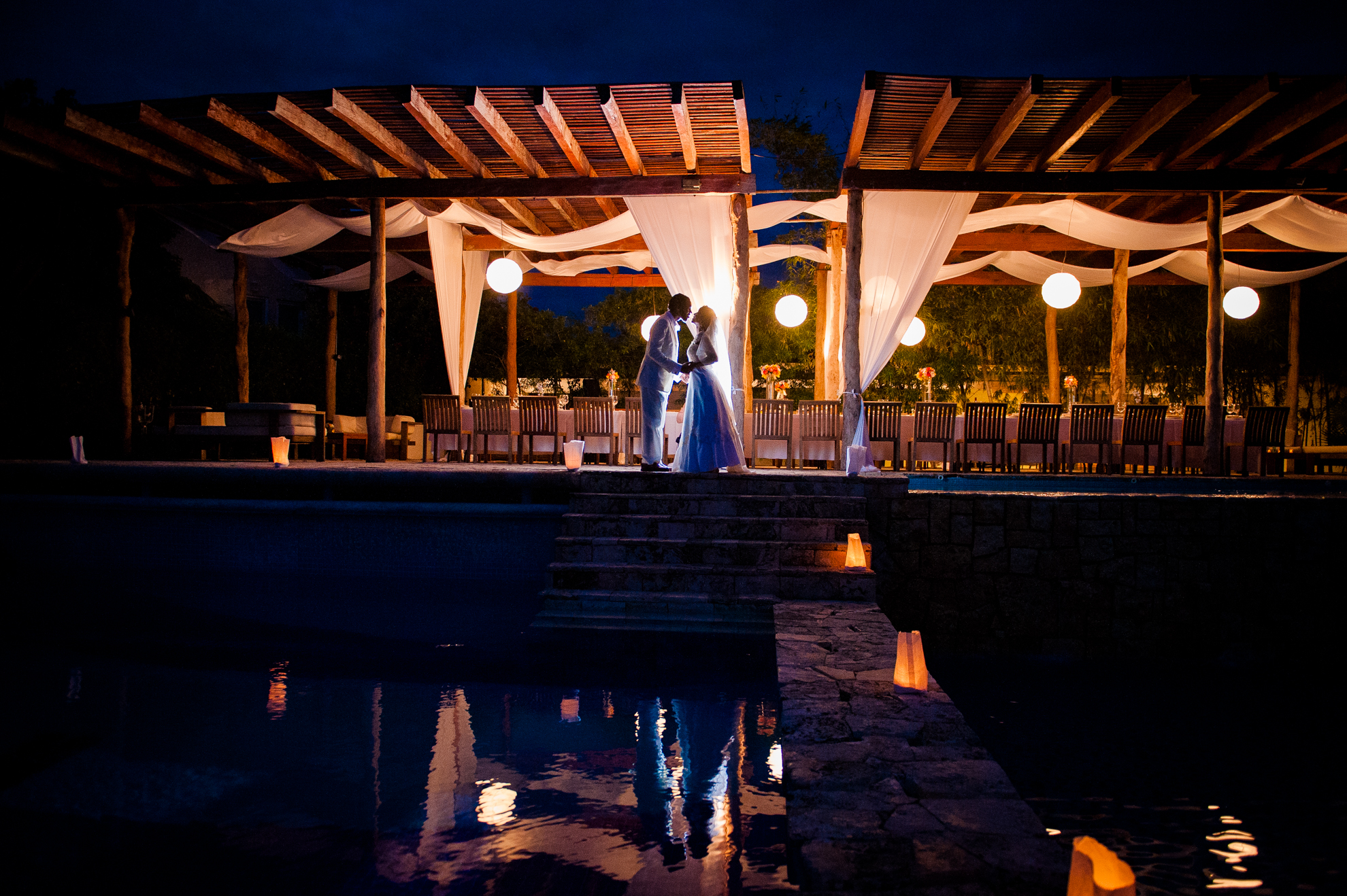 Zama Beach club pool bride and groom portrait 