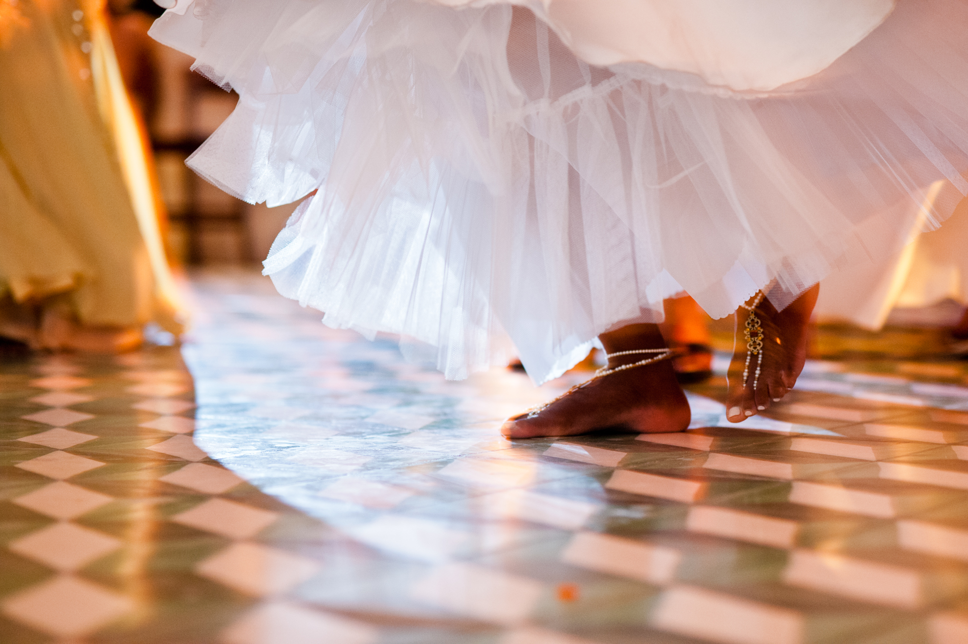 bride dancing barefoot at her destination wedding 