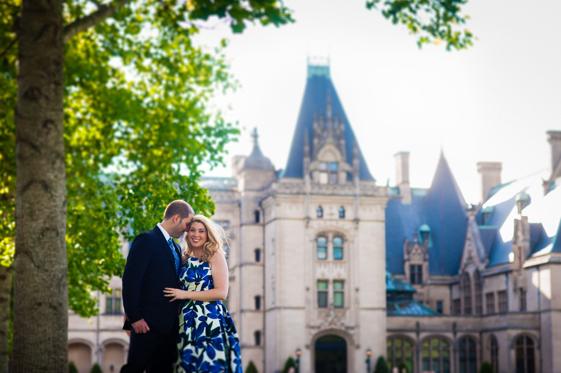 Biltmore estate engagement photo of couple in front of mansion