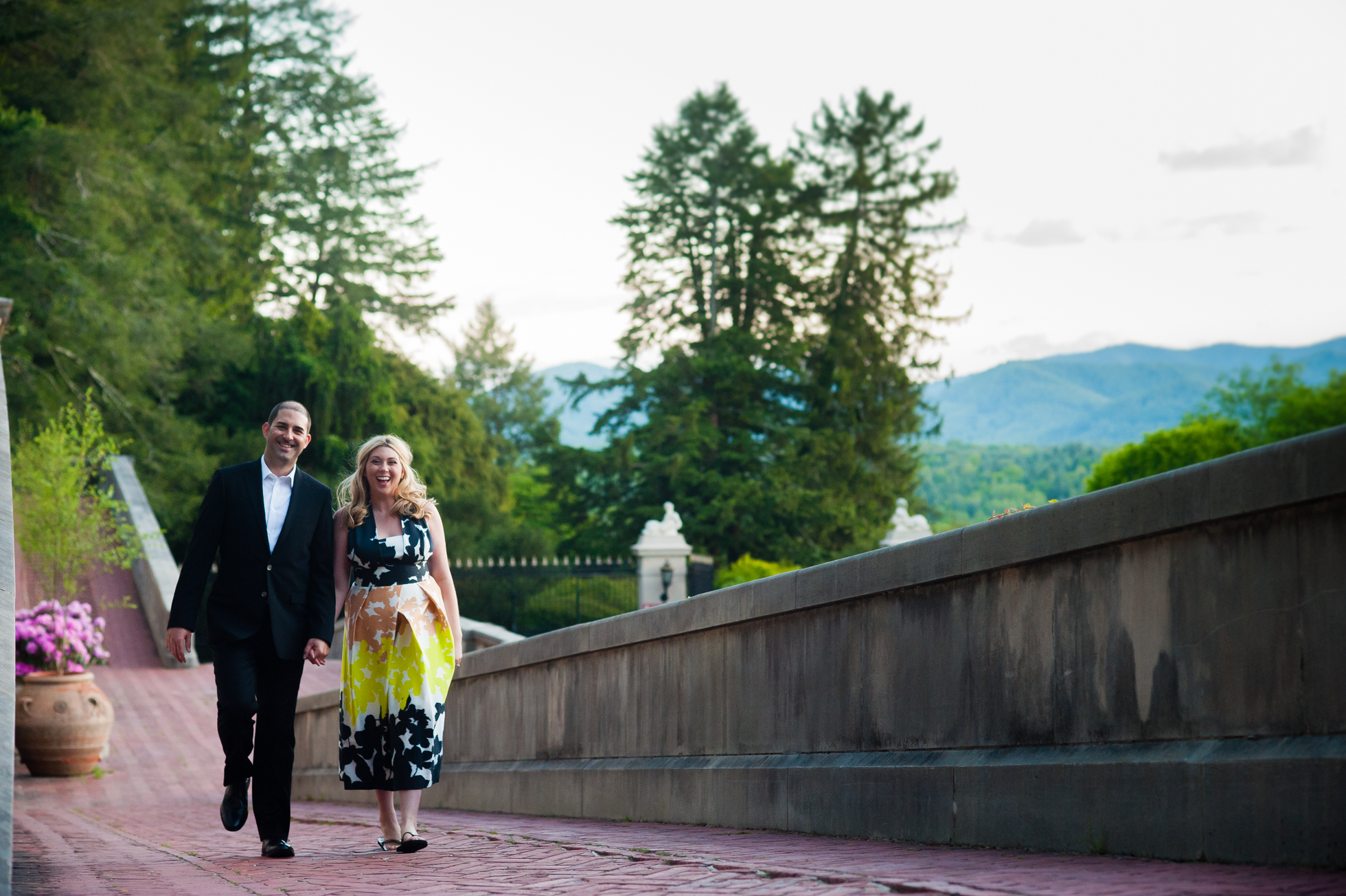 engaged couple holding hands during biltmore engagement session