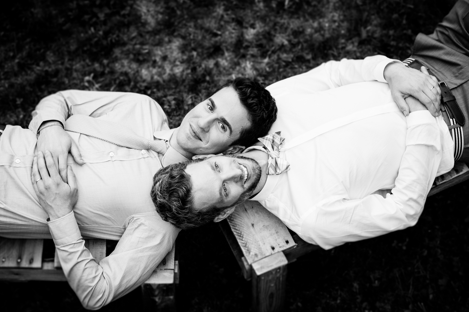 two grooms pose for asheville wedding portrait
