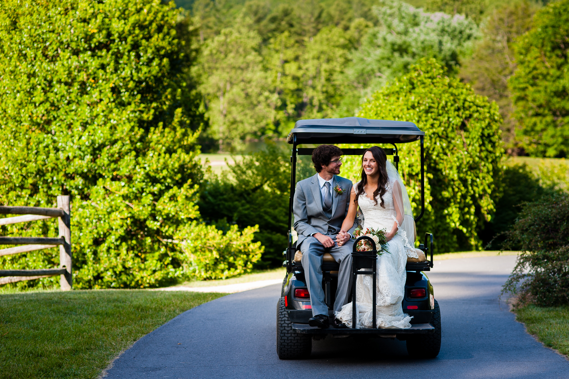 lake eden wedding bride and groom golf cart ride 