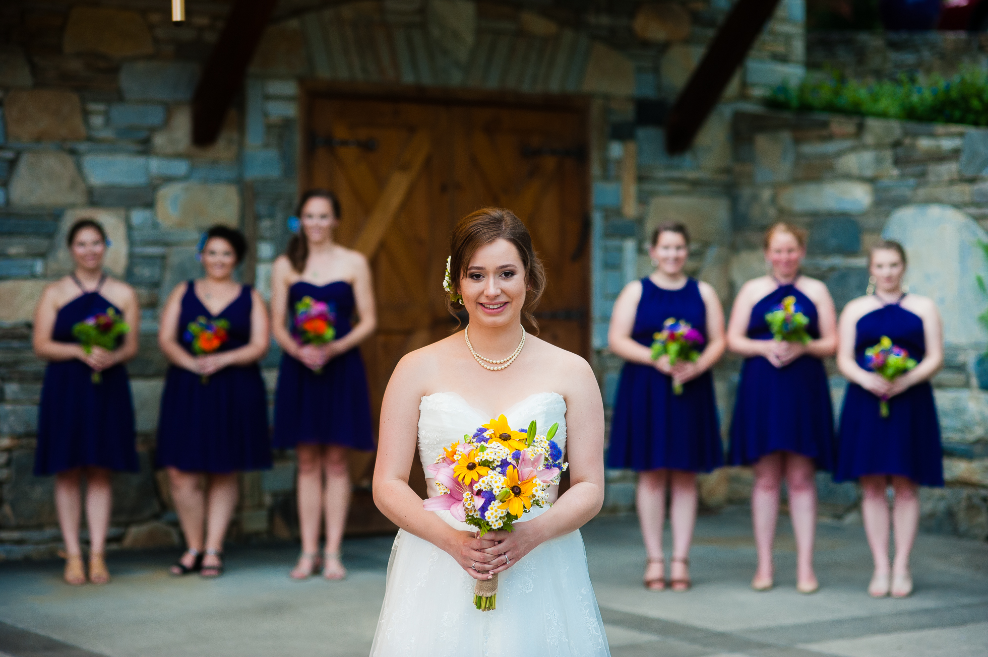 bride and her ladies pose for portrait