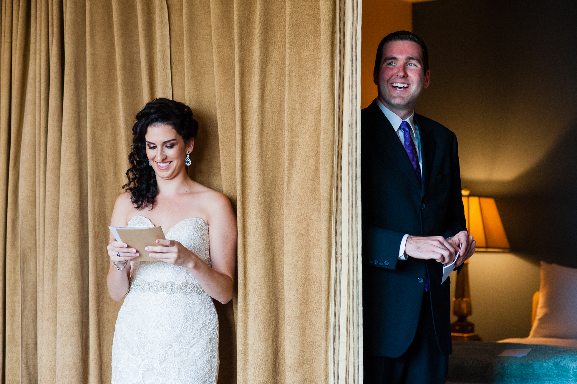 bride and groom exchanging notes during asheville first look