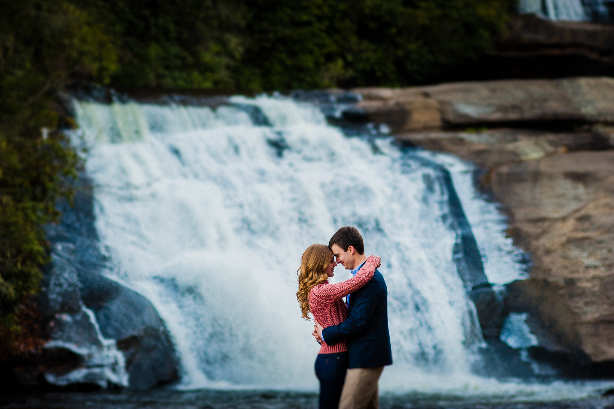 dupont state forest waterfall engagement photo