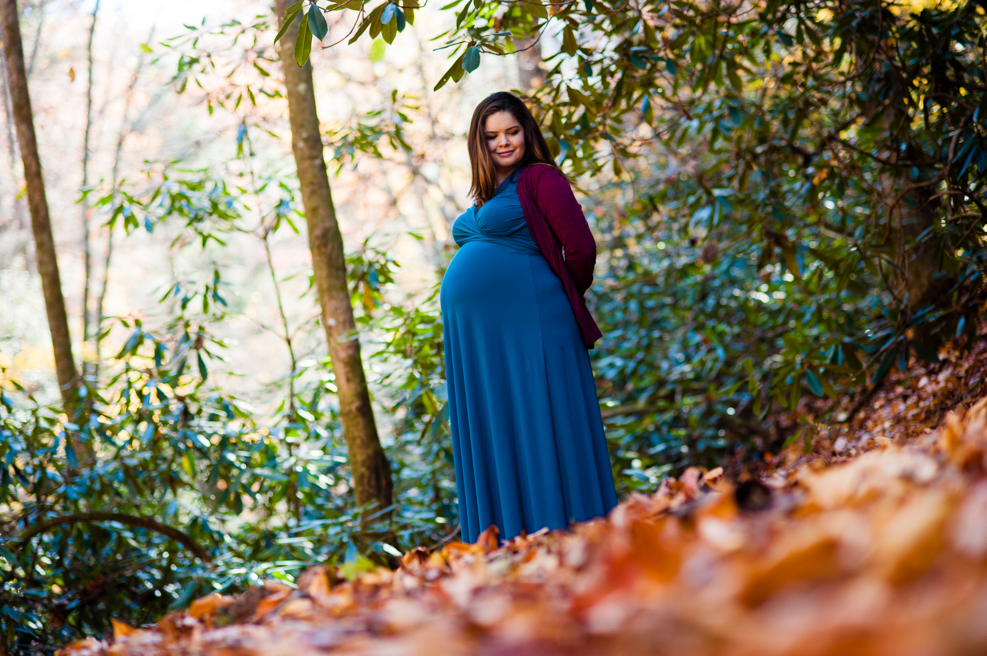 an outdoor asheville maternity photo by AMW Studios | Asheville wedding and lifestyle photographer