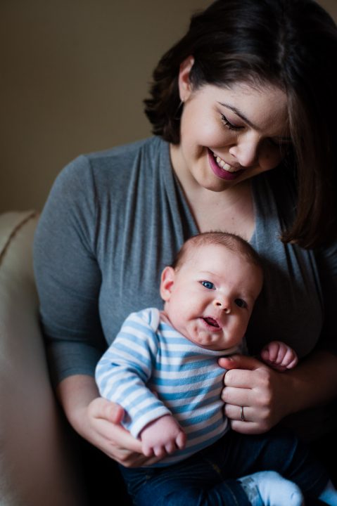 newborn and mom during photo session in tryon 